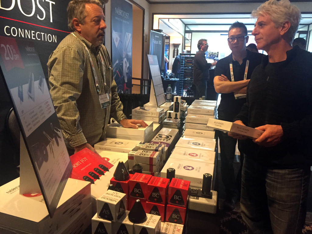 Bruno de Lorimier talks with customers at the Nordost booth